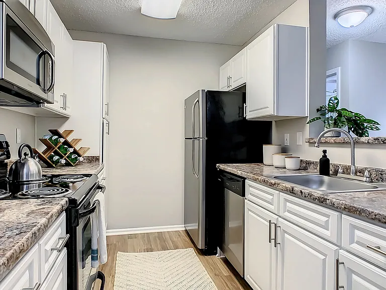 Unleash your inner chef in our chic, contemporary kitchens boasting ample space and modern style, a culinary canvas for exquisite flavors and unforgettable meals.