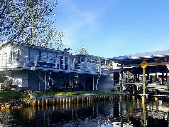 Canal home with Boathouse