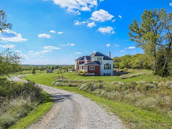 Long driveway to the home lined with Native Prairie Grass.