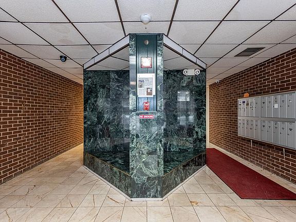 Professional Lobby with security cameras and mailboxes