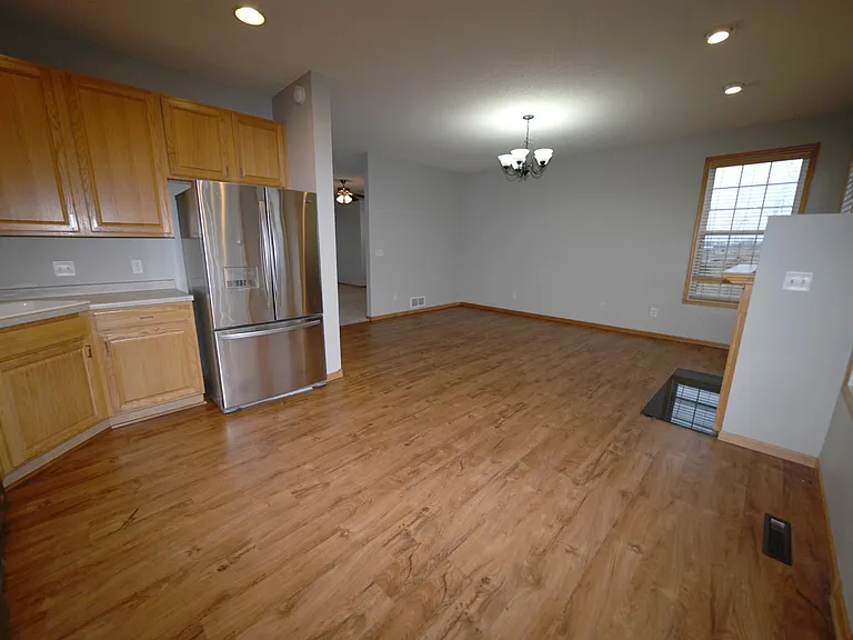 Large eat-in kitchen with new flooring