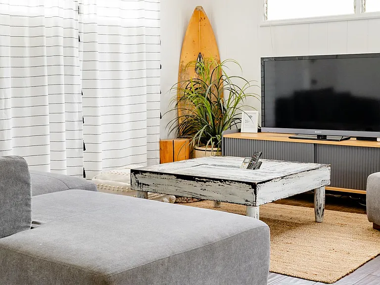 Gather around your cozy living room equipped with high powered air conditioning.
