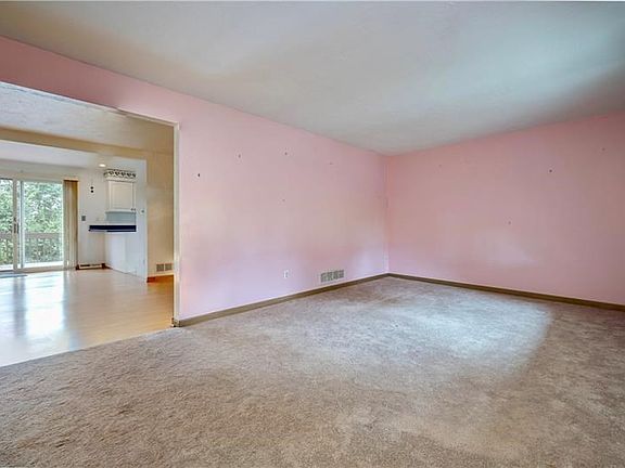 21x13 Living room with newer carpet.