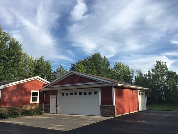 Garage of your DREAMS : Three car garage with clever side load design. Plenty of storage and it's he