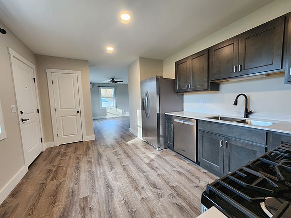 Kitchen view to front door , closet and livingroom