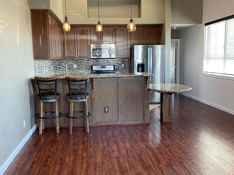 open concept- living room looking into kitchen