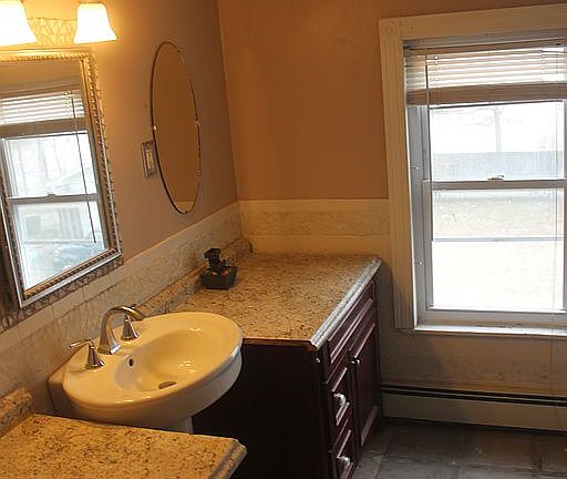 Bathroom with cast iron tub