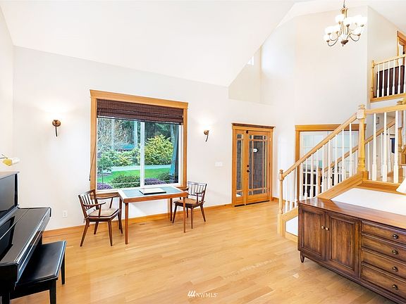 Enter to living room on your right.