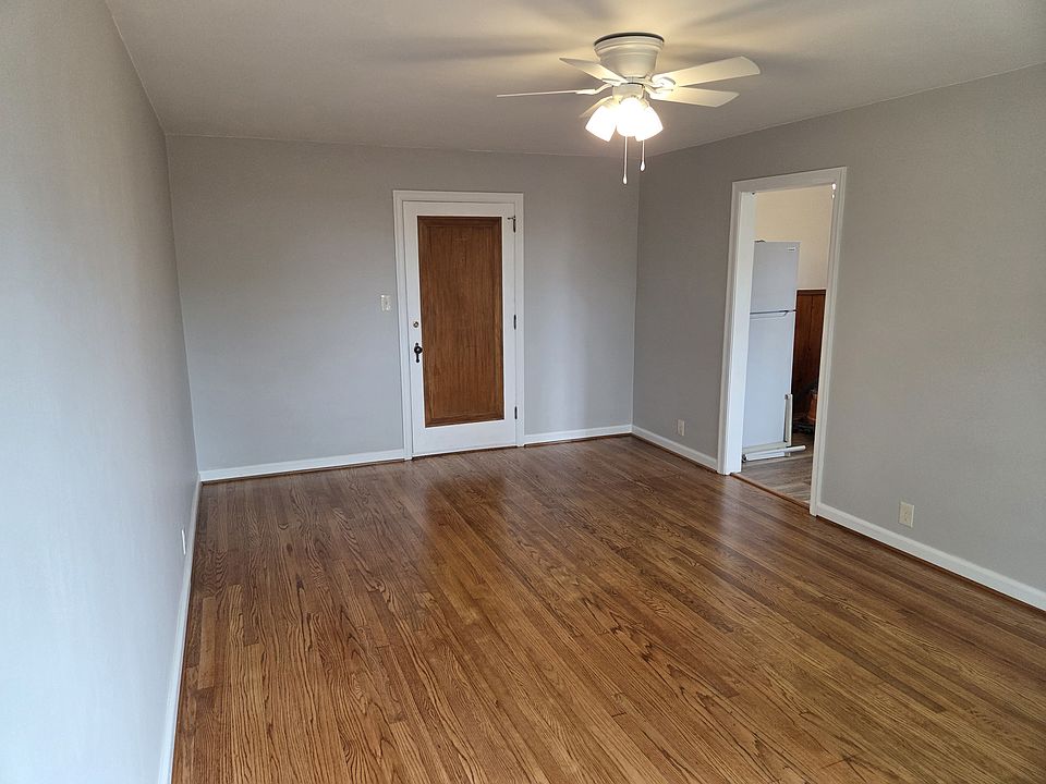 Living room; photo from far end by window