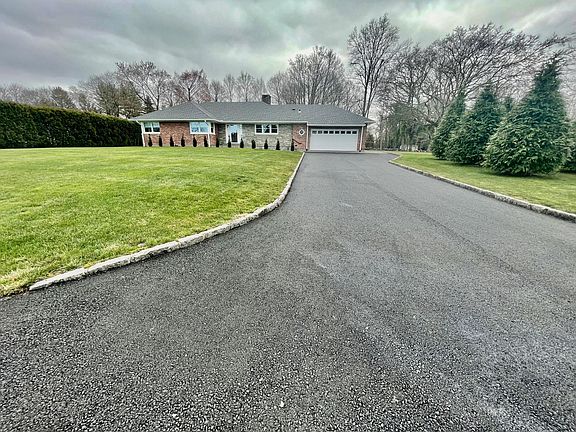 ALL NEW DRIVEWAY AND LARGE 2 CAR GARAGE