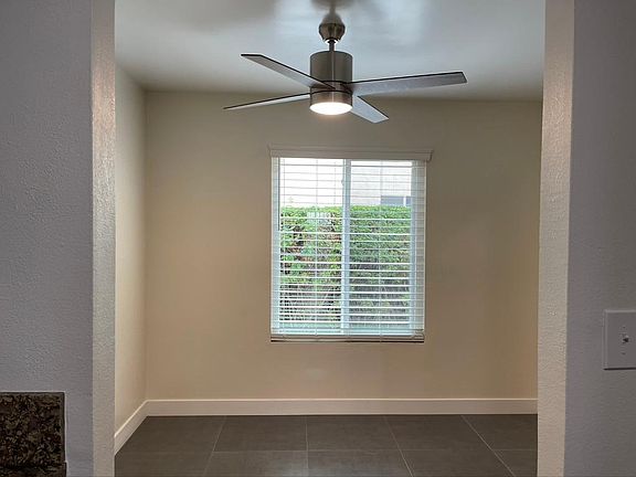 Dining Room with window and new ceiling fan!