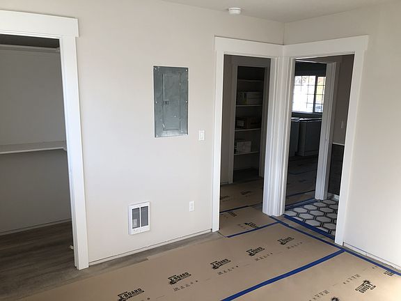 Each spacious bedroom has luxury vinyl plank flooring throughout, a large closet, and ensuite bathroom. Furnished with a full bed (bring your own linens), desk, shelving, & window blinds.