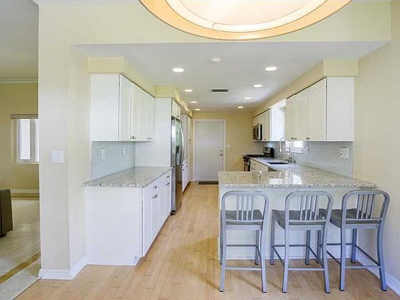 Picturesque Home in Gated North Bay Island!