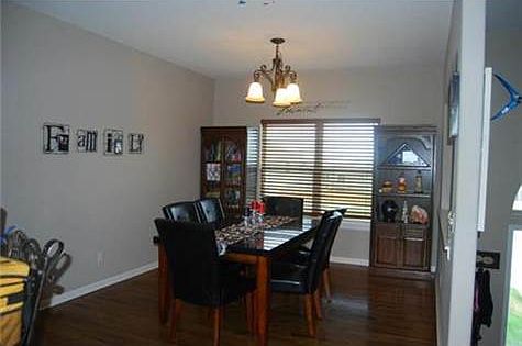 Formal dining off of kitchen beautiful hardwood floors 11' x 11'