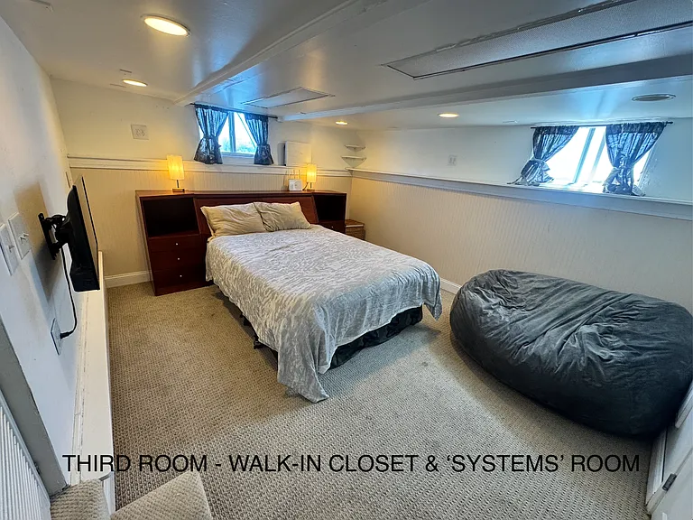 Third 'submariner' room. Again, lots of natural light. A walk-in 'systems' closet has a lot of storage space.