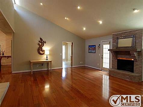 Living room with dramatic lighting and lines with beautiful hard