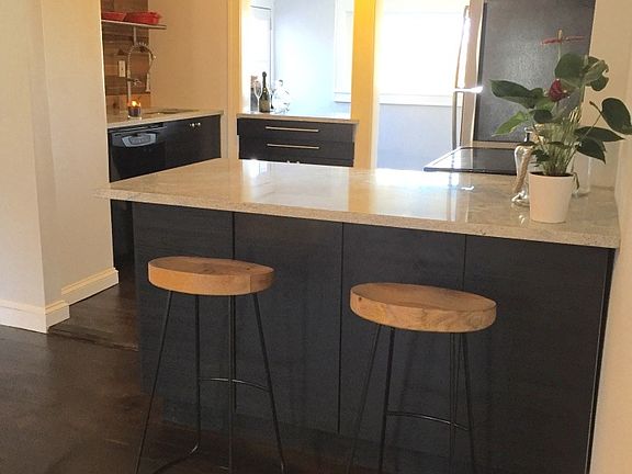 View from island, overlooking kitchen, additional storage on