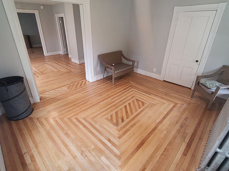 This is a large "bonus" room with 6 foot pocket doors original to the building. This could be used as an office, den, tv room, playroom or even a 3rd bedroom.