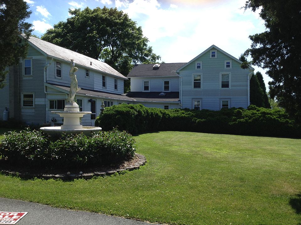 Entering driveway, duplex 