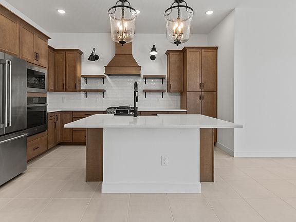 Kitchen with striking pendant lighting