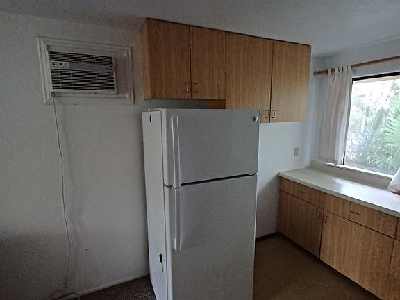 Fridge less than 1 year old. Cold A/C. Also includes Microwave, Toaster Oven, Hot Plate, Griddle, Coffee Maker