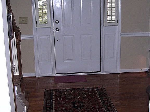 Shining hardwood floor welcomes visitors