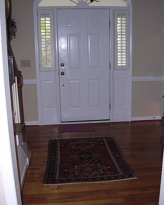 Shining hardwood floor welcomes visitors