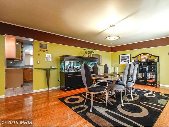 Beautiful Formal Dining Room with Hardwoods.