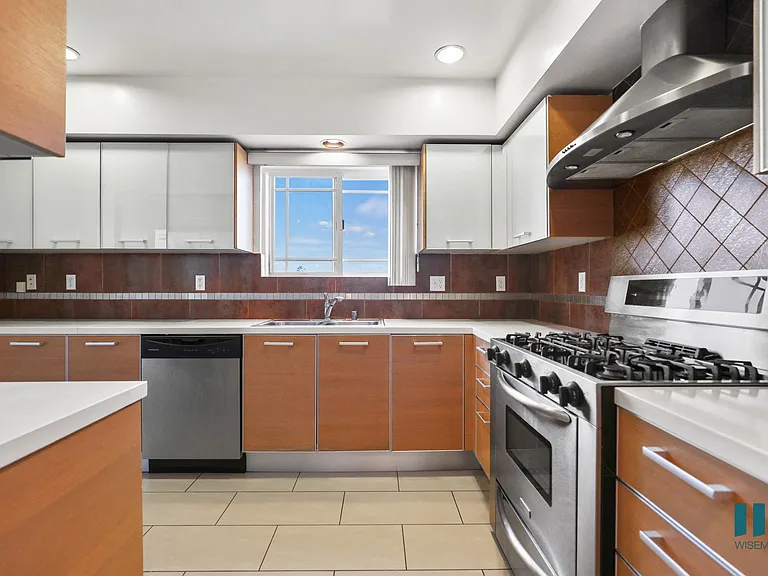 Kitchen with Stainless Steel Appliances and Ample Cabinet Storage