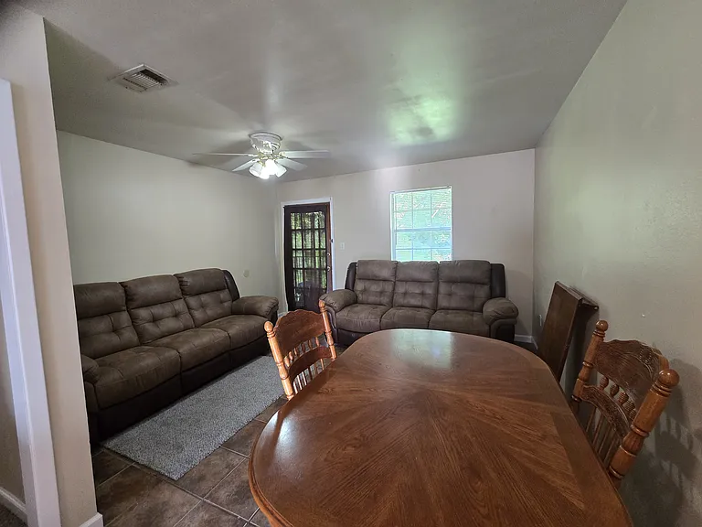 Living Room with sofas and dining table included