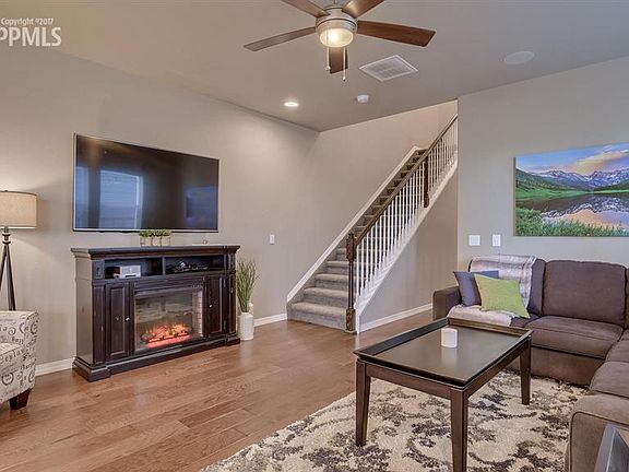 The spacious family room with beautiful wood floors!