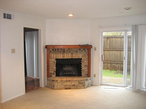 Living Room with Fireplace and private patio