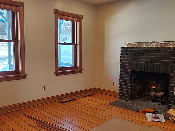 Living room, working fireplace (with mantel soon to be installed).
