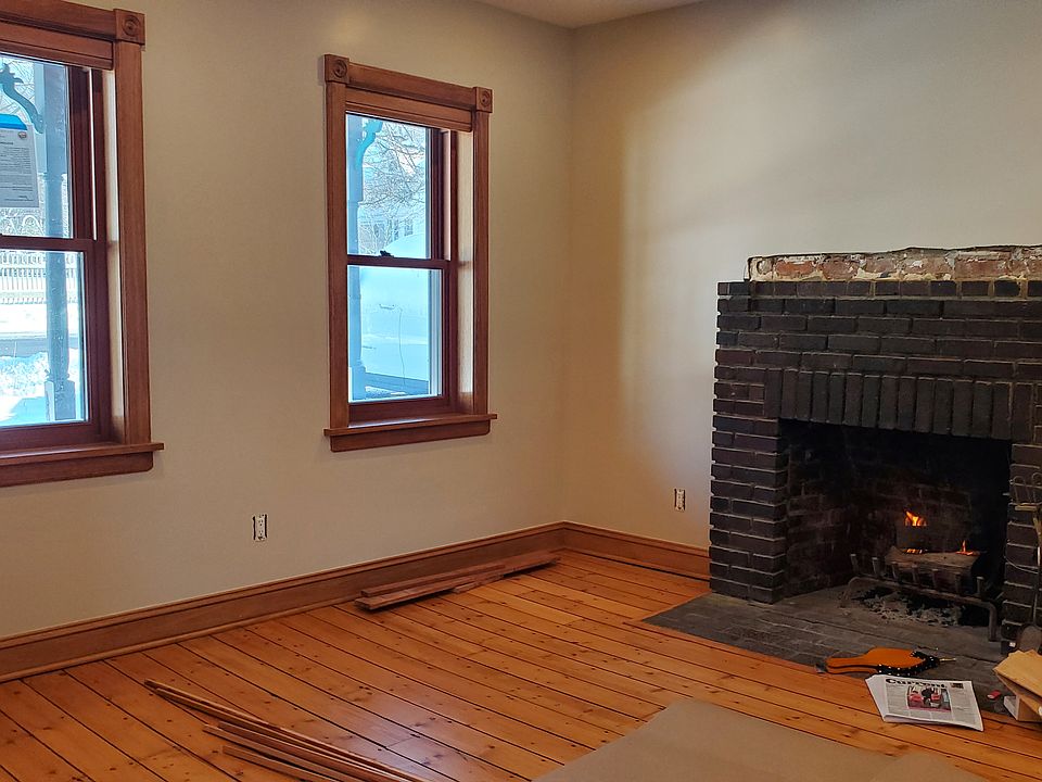 Living room, working fireplace (with mantel soon to be installed).