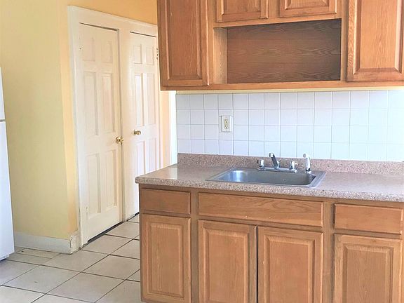 Kitchen with oak cabinets