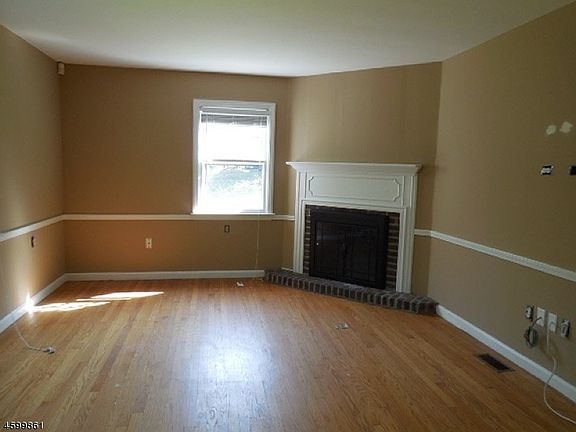 Living Room w wood burning fireplace