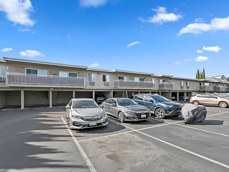 Ample parking featuring designated spaces for residents