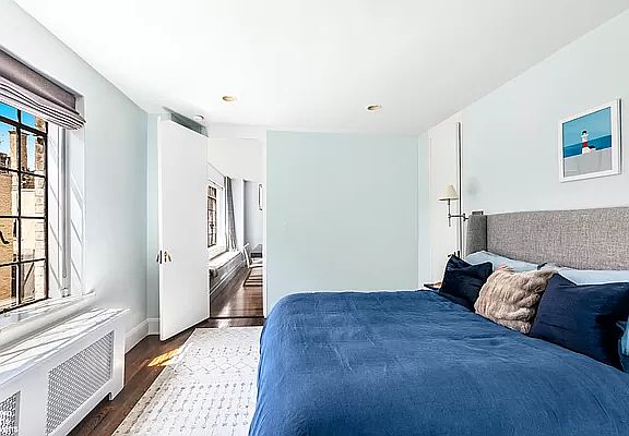 5th image of 40-50 E 10th St APT 9L