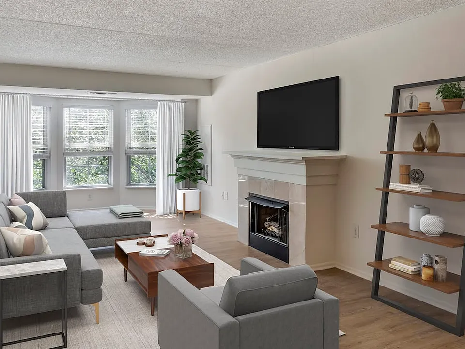 Renovated Package III living area with hard surface plank flooring