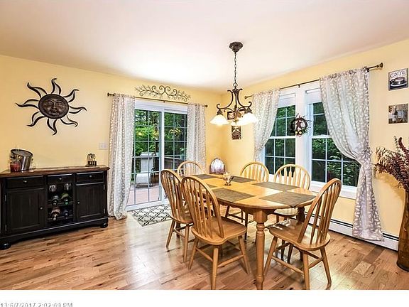 Dining area offers space for sharing meals together just off the....