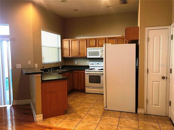5th image of 8703 Jasmeen Garden Ct