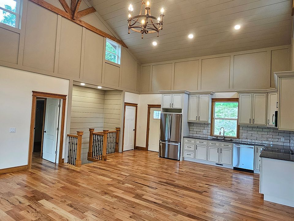 Vaulted wood ceiling in living room and kitchen