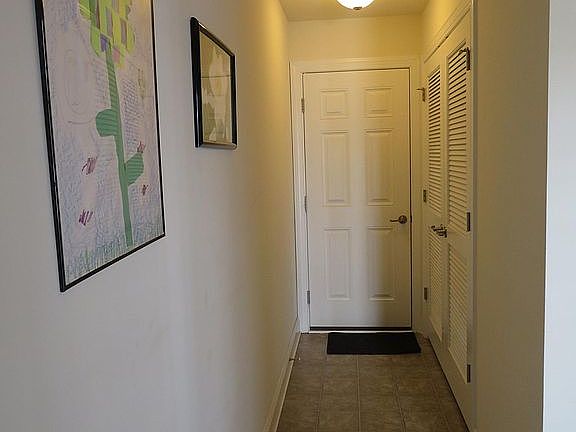 Hall front entry to garage