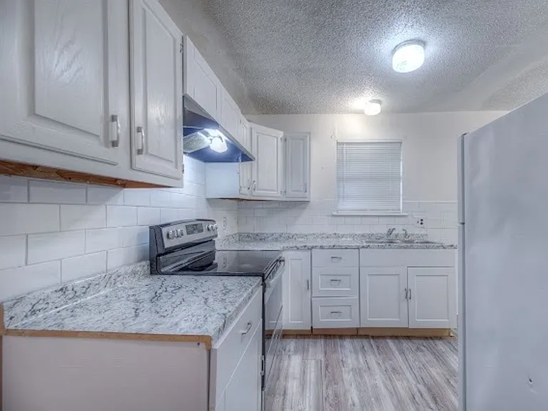 1129 S 124th East Ave — Photo 15