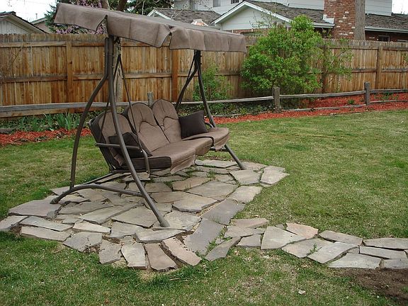 Flagstone walk to backyard swing