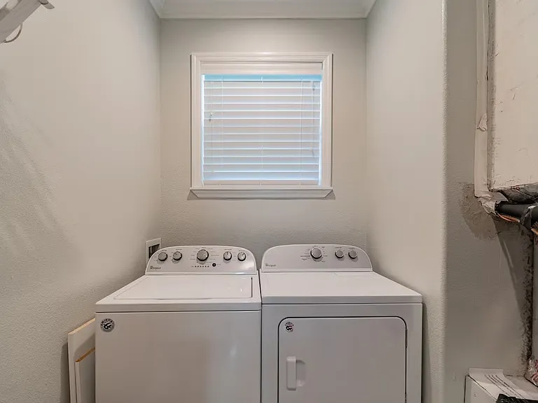 Laundry room with washer and dryer