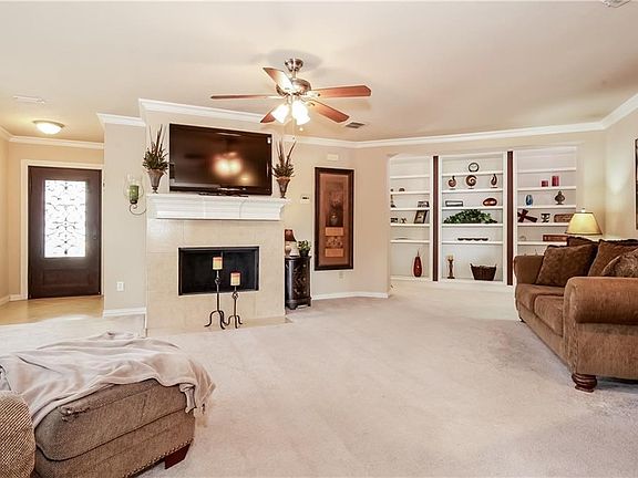 Wood burning fireplace, flat screen wiring and built ins.