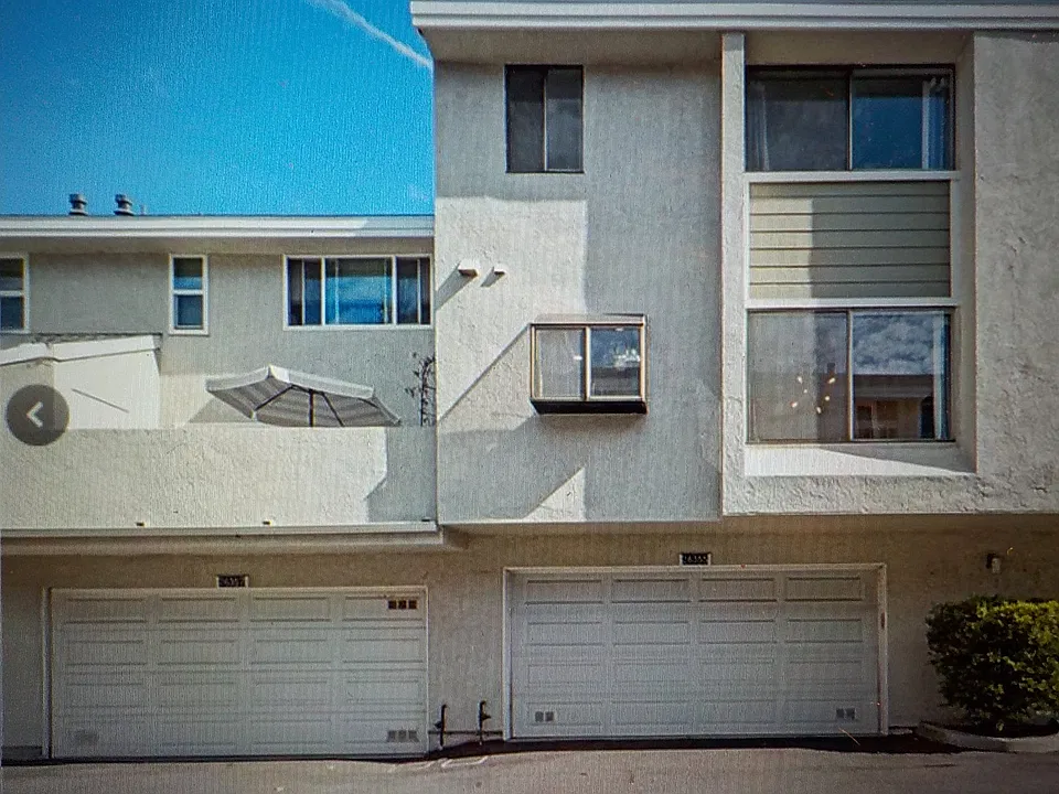 Rear View and 2-Car Garage Exterior