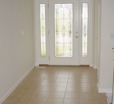 FOYER - Glass Door/Side Lts + Ceramic Flr