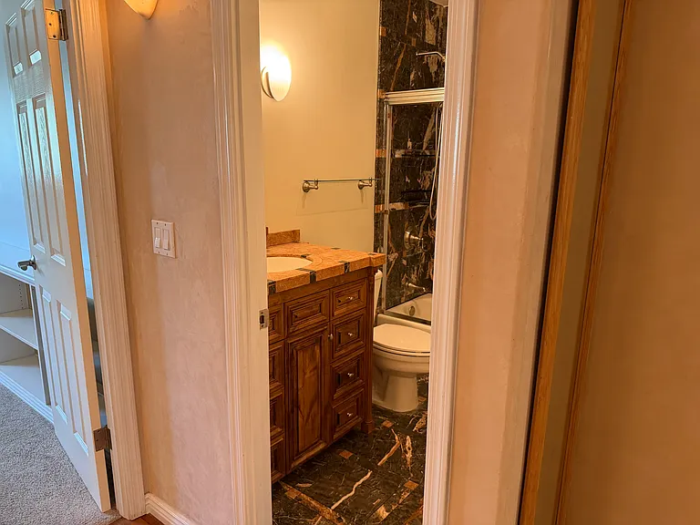 Guest Bathroom - Full with shower and tub.